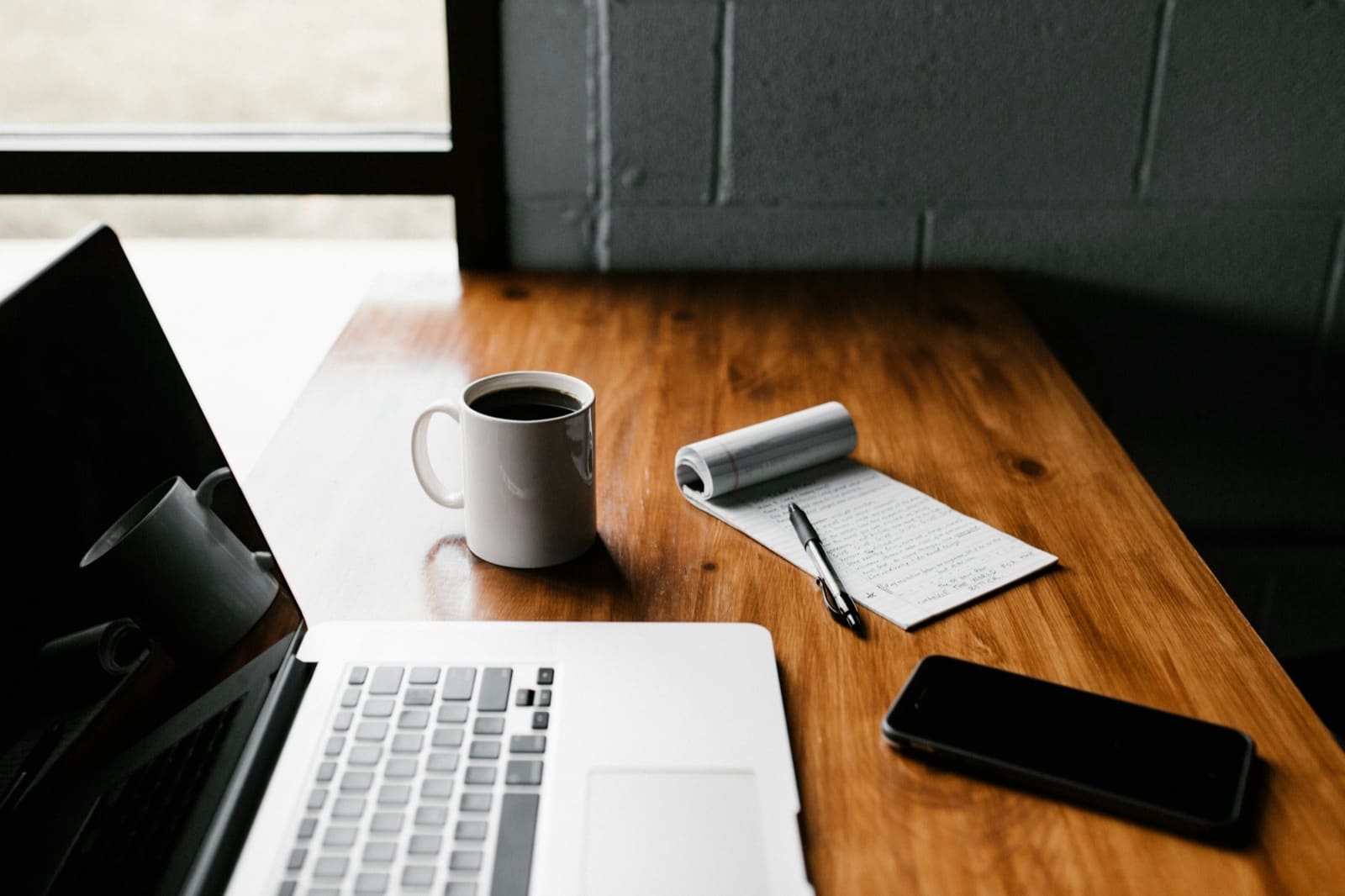 Working out the true cost of a Costa del Sol purchase — notes and a laptop
