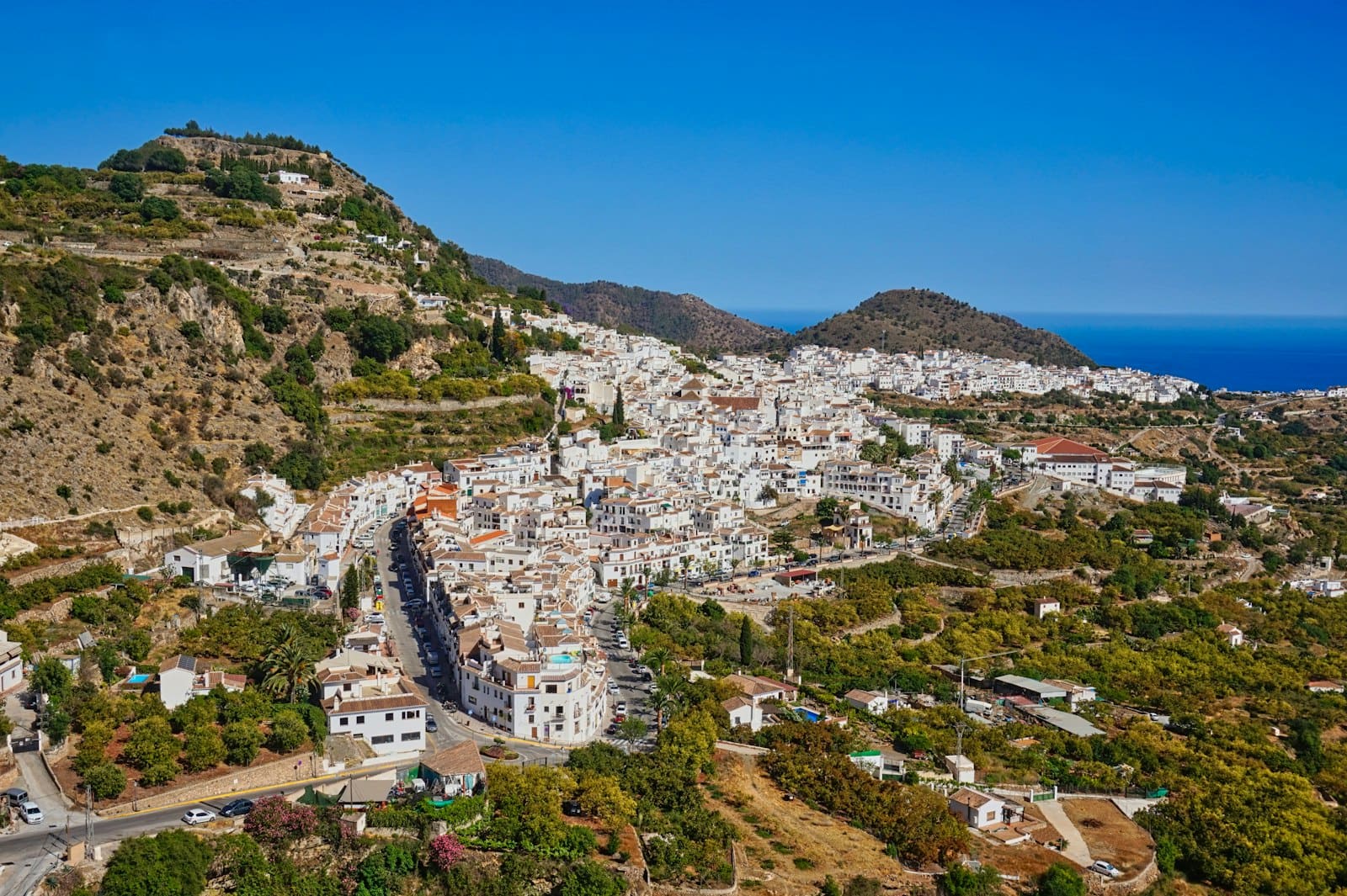 Frigiliana's whitewashed hillside streets above the Mediterranean
