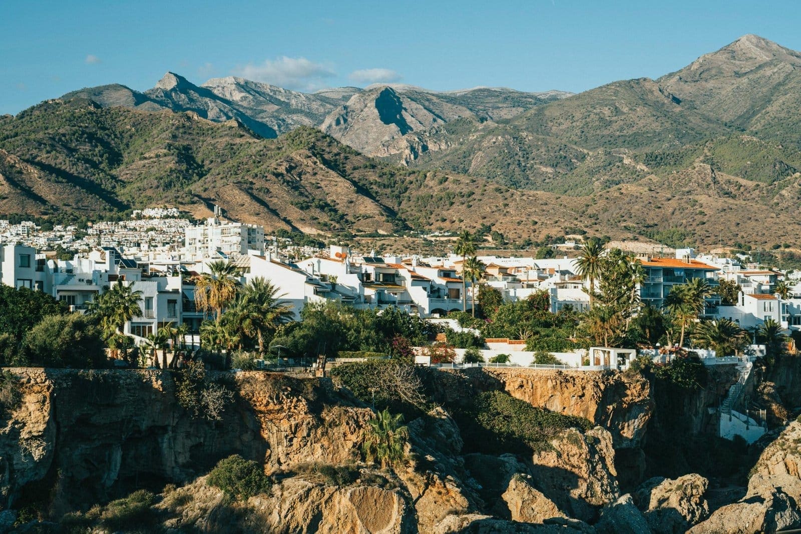 A white Andalusian village in green hills above the Costa del Sol