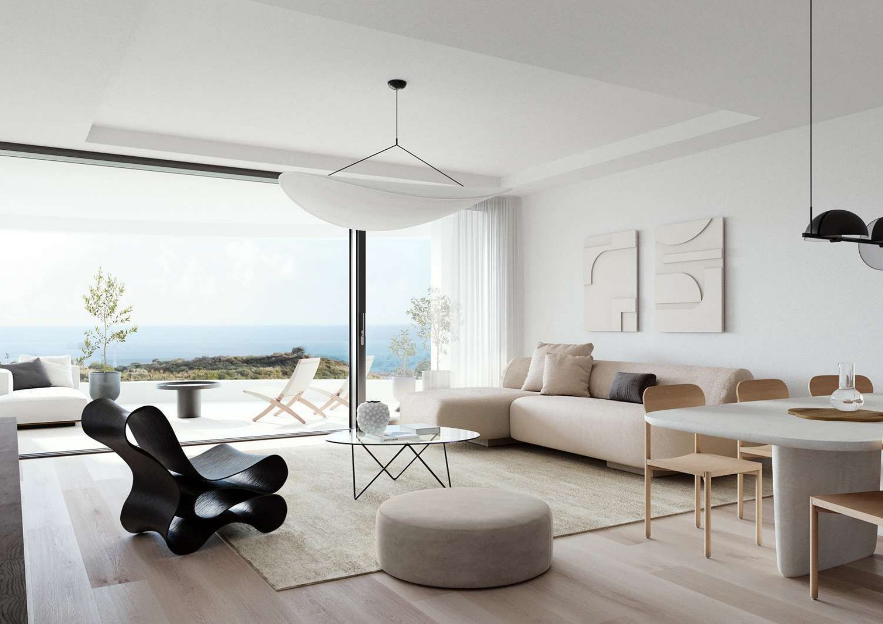 The open-plan living and dining room of one of the houses in the developer’s illustrations, with glass doors to the terrace and the sea beyond. Aalto Residences, Riviera del Sol, Mijas.