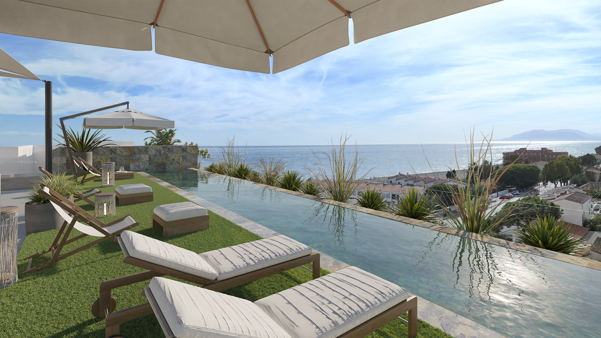 The rooftop lounge terrace beside the pool, with sun loungers and a shaded seating area. Almara Residences, Benagalbón, Rincón de la Victoria.