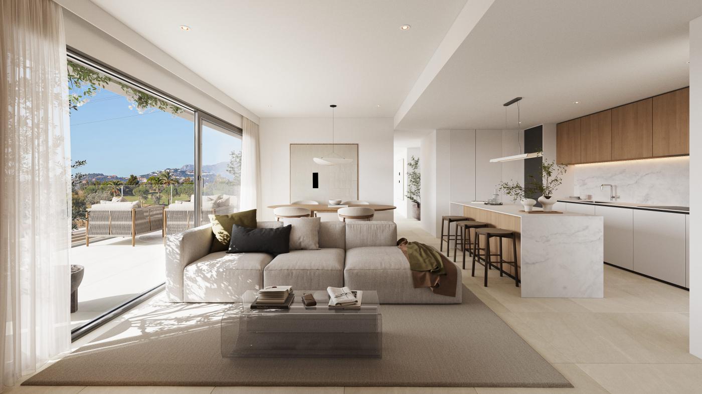 The living room and kitchen, with glass doors opening onto the terrace. Altos del Chaparral, El Chaparral, Mijas.