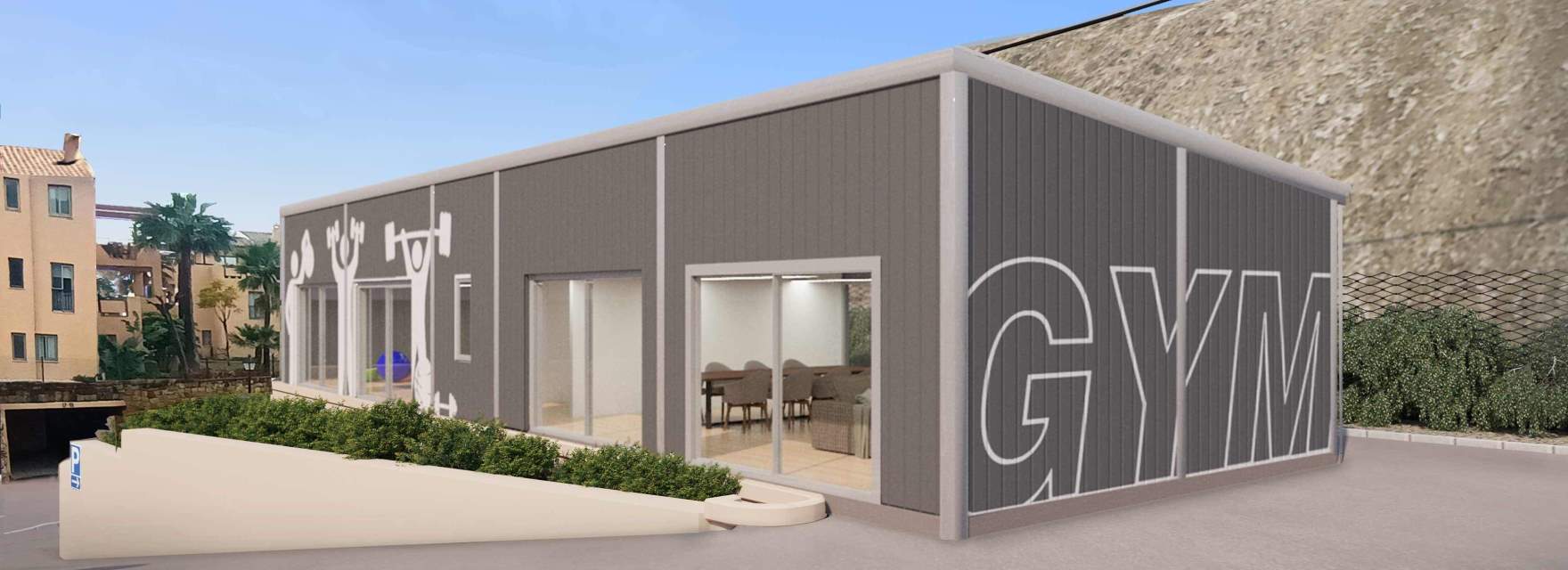 The gym, a small building clad in grey, with its name lettered across one wall. Altura 160, Señorío de Cifuentes, Benahavís.