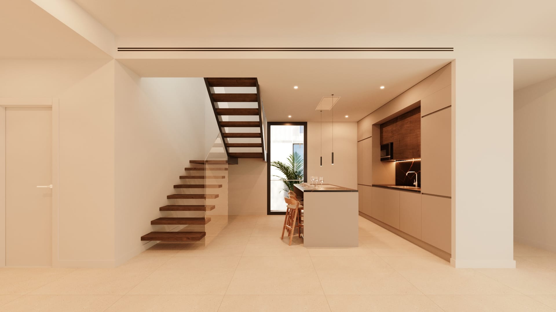 An open kitchen and living room inside one of the homes. Armonía, San Pedro de Alcántara, Marbella.