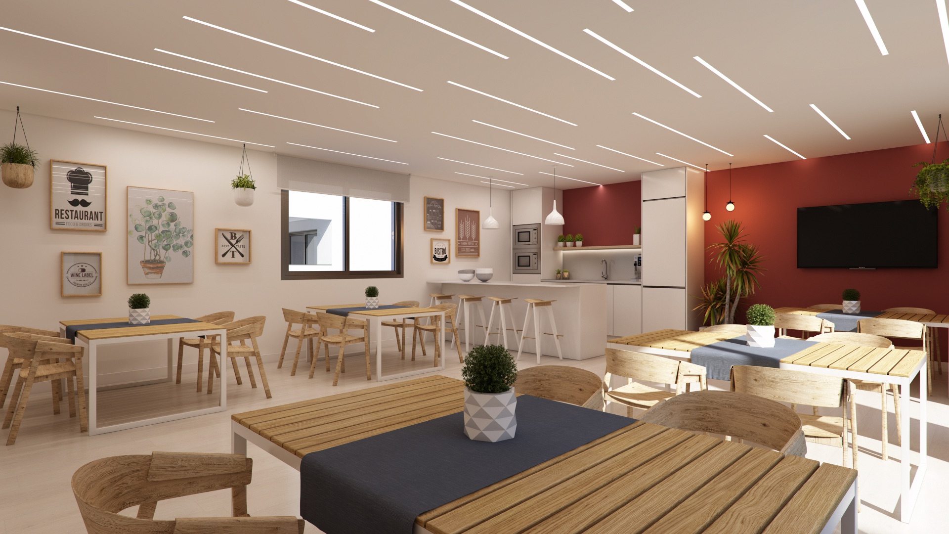 The gourmet room, laid out with tables for residents to cook and eat together. Arrecife, Casares Costa, Casares.