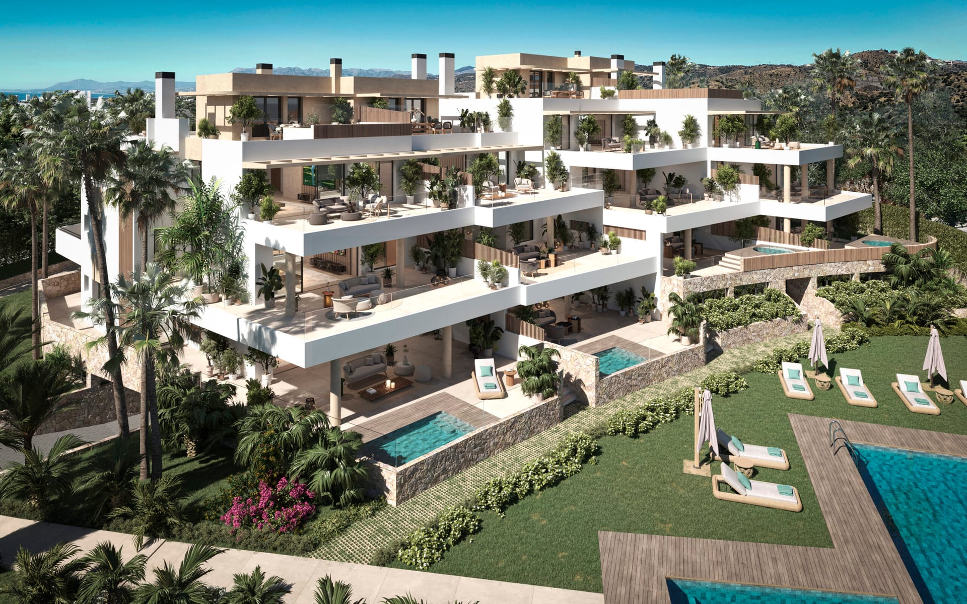 One of the two pools, with the apartments stepping up behind it. Aruna, Cabopino, Marbella.