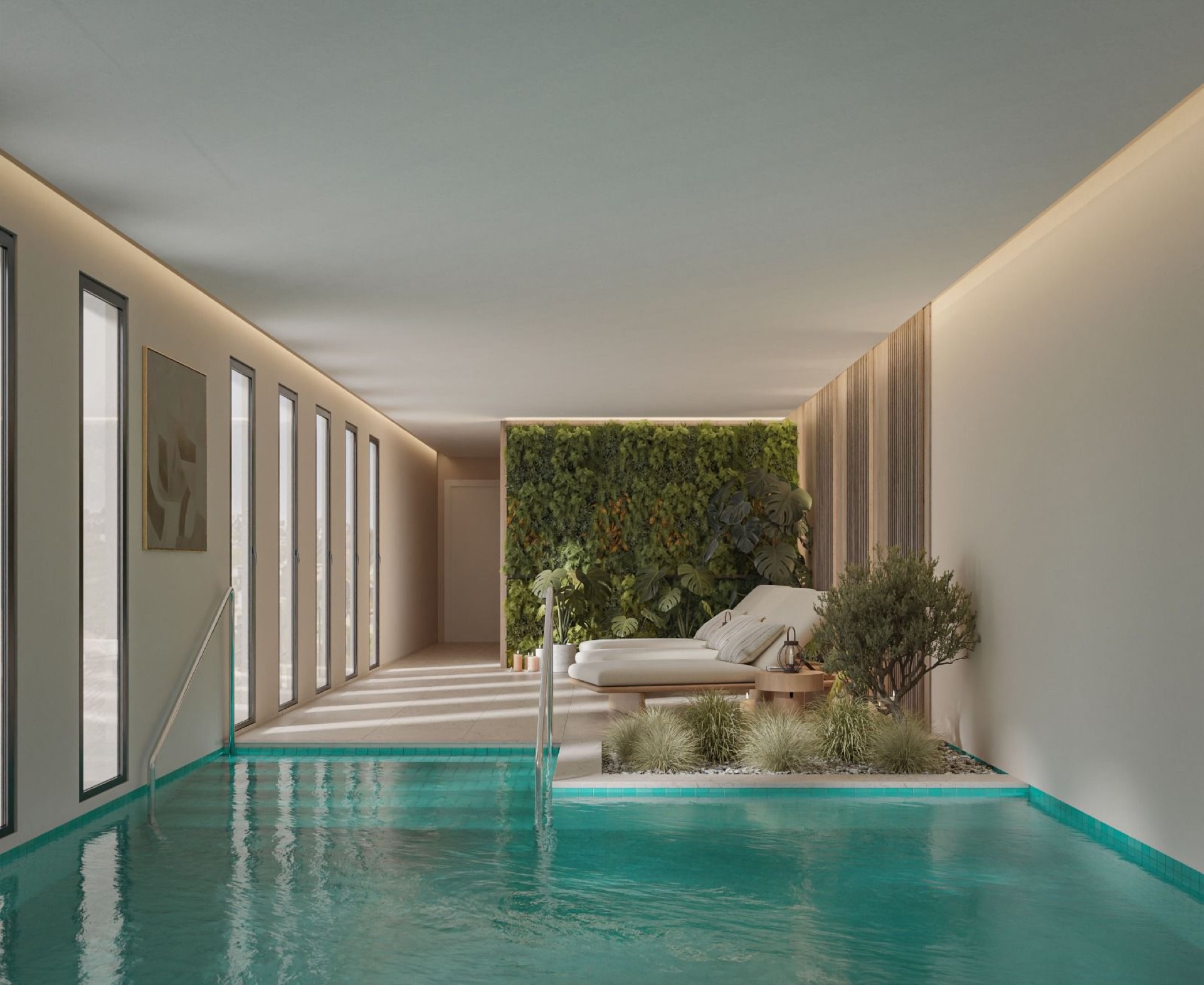 The indoor pool in the spa, with a planted wall and loungers at one end. Balance Nova, Hipódromo, Mijas.