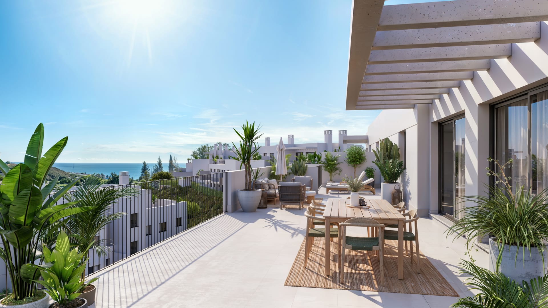 A large terrace on the top floor, with a pergola, a dining table and a view to the sea. Baviera Golf, Baviera Golf, Caleta de Vélez.