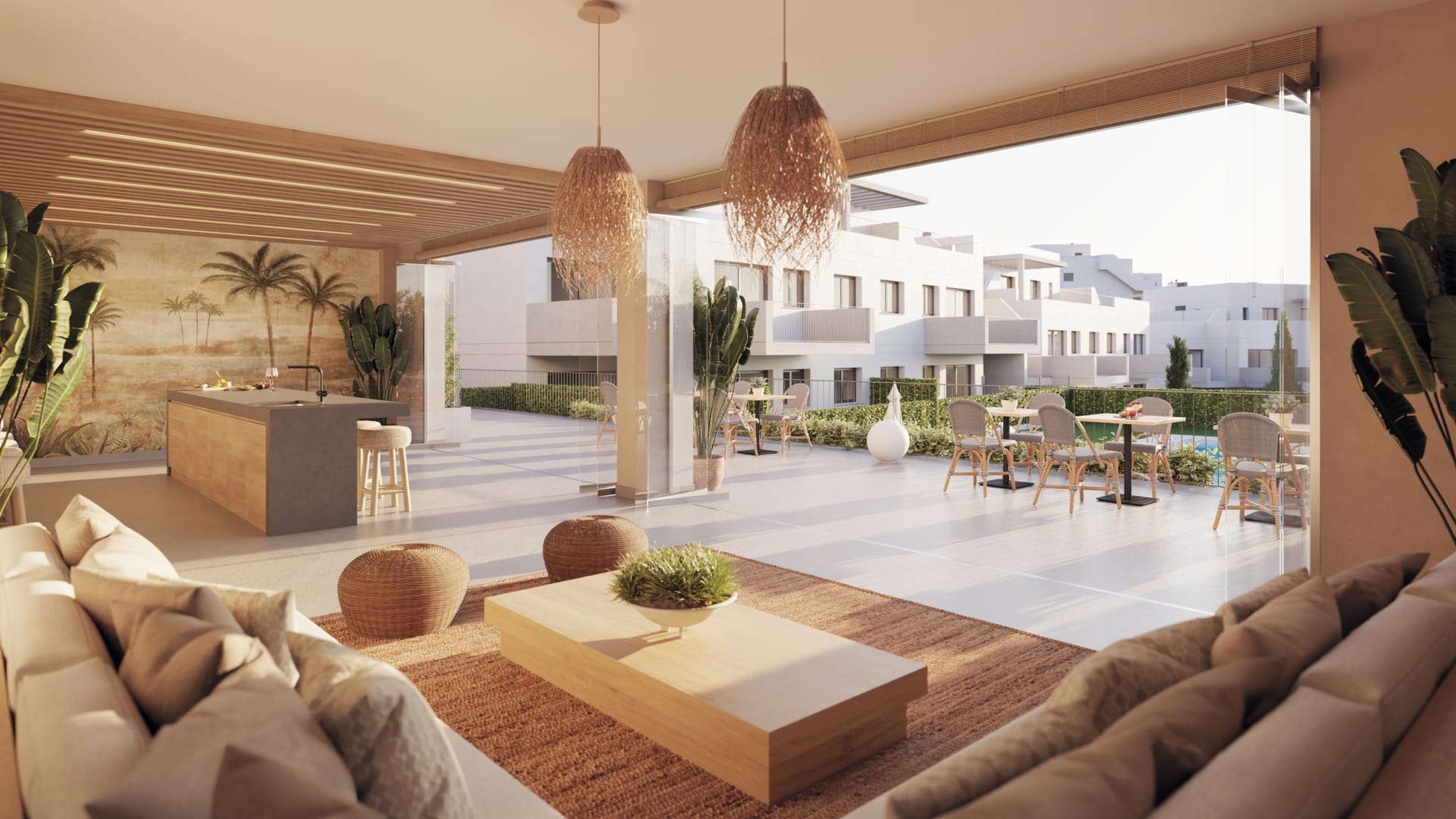 The social room in the second phase, with sofas, a kitchen island and glass doors opening onto a terrace with tables. Baviera Golf, Baviera Golf, Caleta de Vélez.