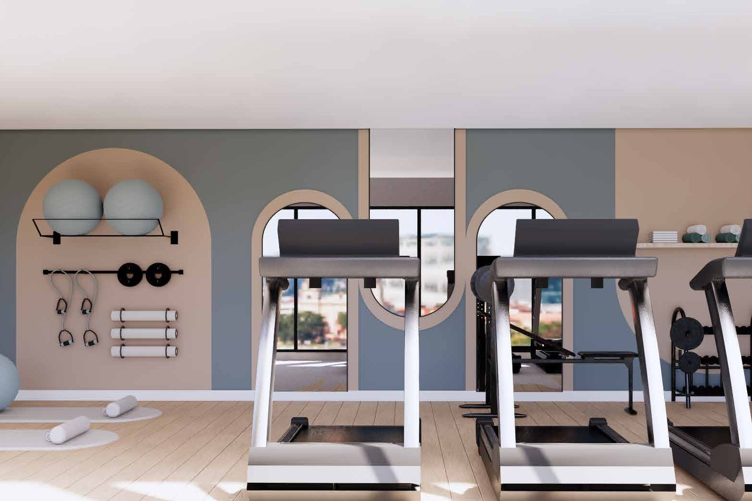The gym, with treadmills and bikes in front of arched mirrors, a rack of weights on the wall, and a run of glazing at the end. Cala Swing, La Cala de Mijas, Mijas.