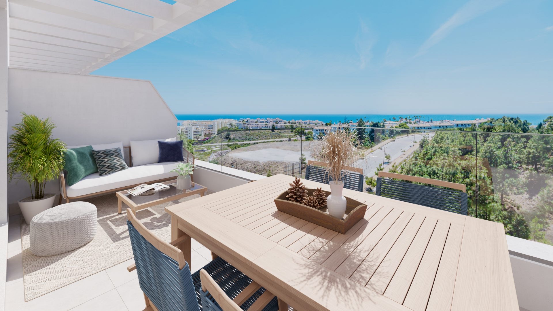 A private rooftop terrace, with a dining table, a sofa and the sea in view. Célere Sunrise, El Chaparral, Mijas.
