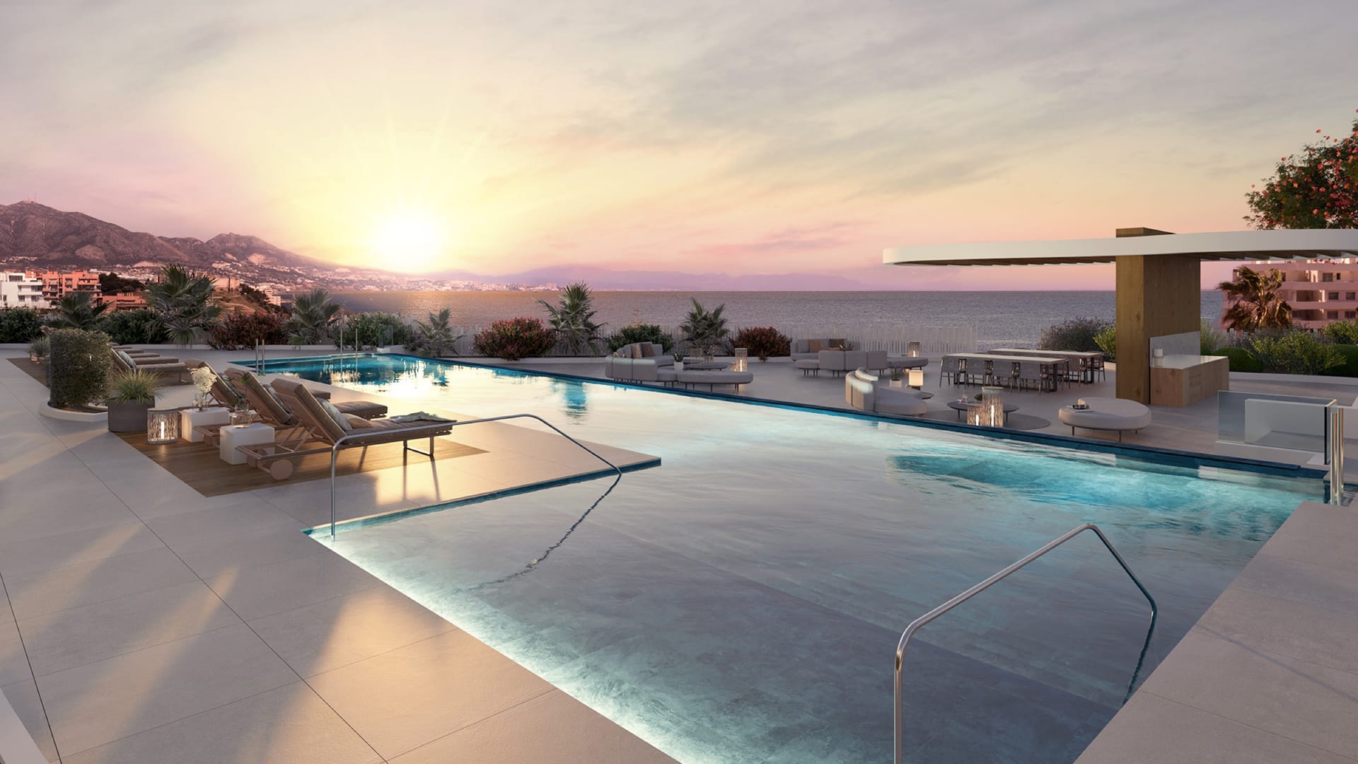 The infinity pool at sunset, with the coast towards Fuengirola behind. Elysea Suites, El Chaparral, Mijas.