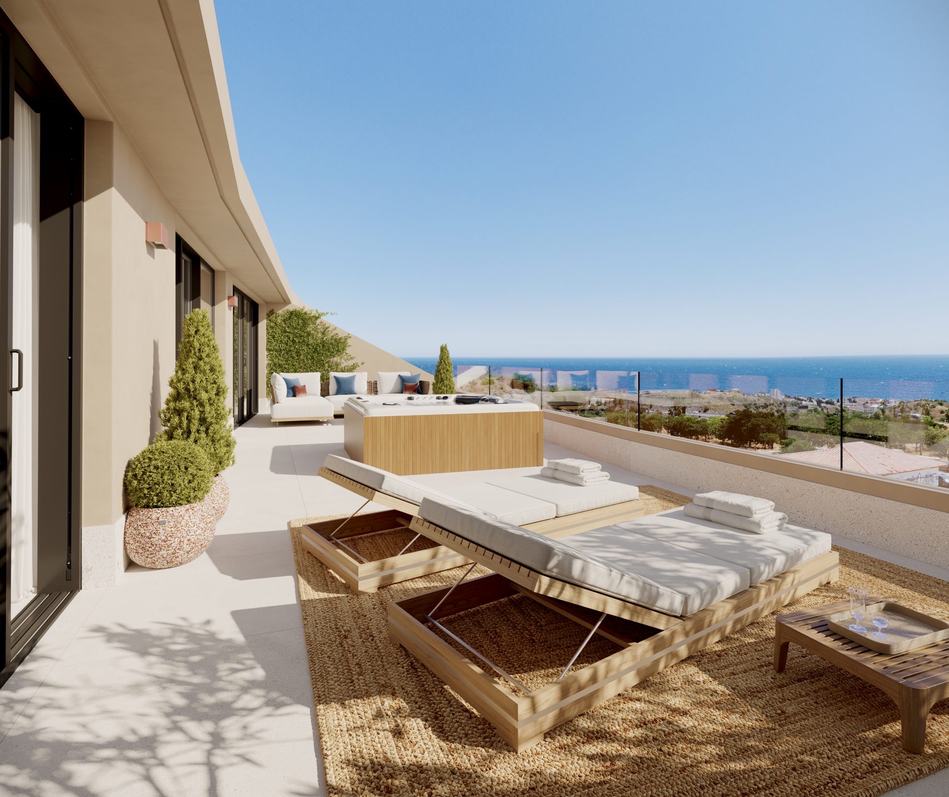 A sky villa’s private terrace, with its own jacuzzi and the sea in view below. Evoque Residences, El Higuerón, Fuengirola.