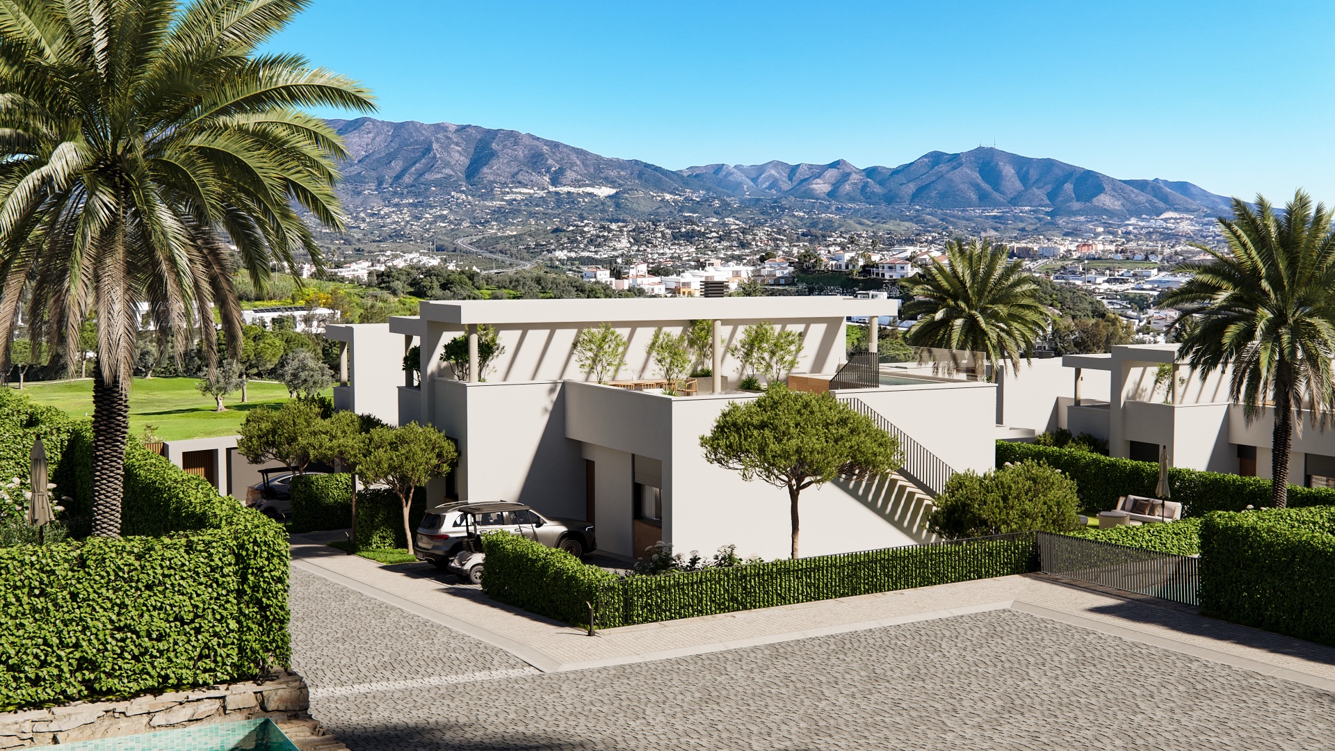 The approach to the scheme, with the hills behind Mijas in the distance. Green Valley, Cerrado del Águila, Mijas.
