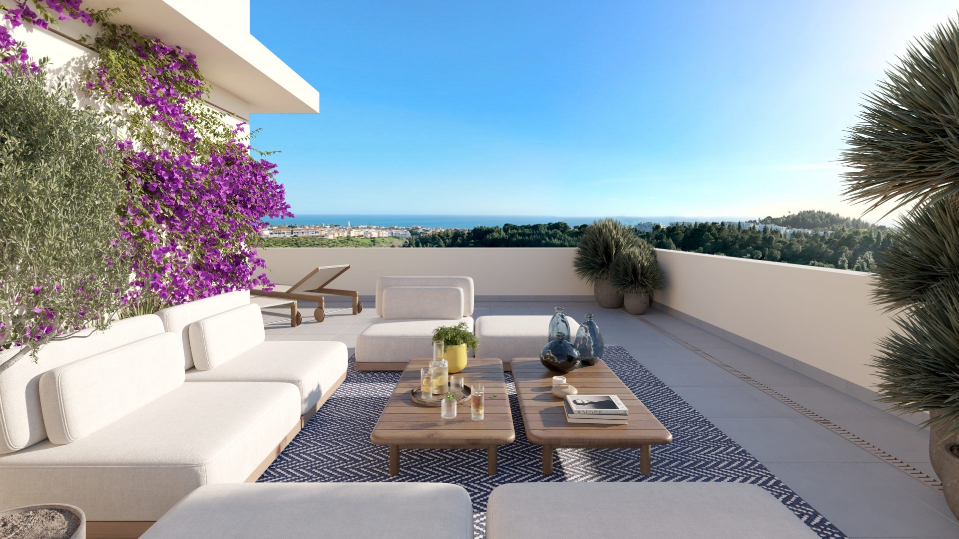 A top-floor terrace's outdoor lounge, framed by bougainvillea, with Mijas Costa and the sea below. Greenity, Las Lagunas de Mijas, Mijas.