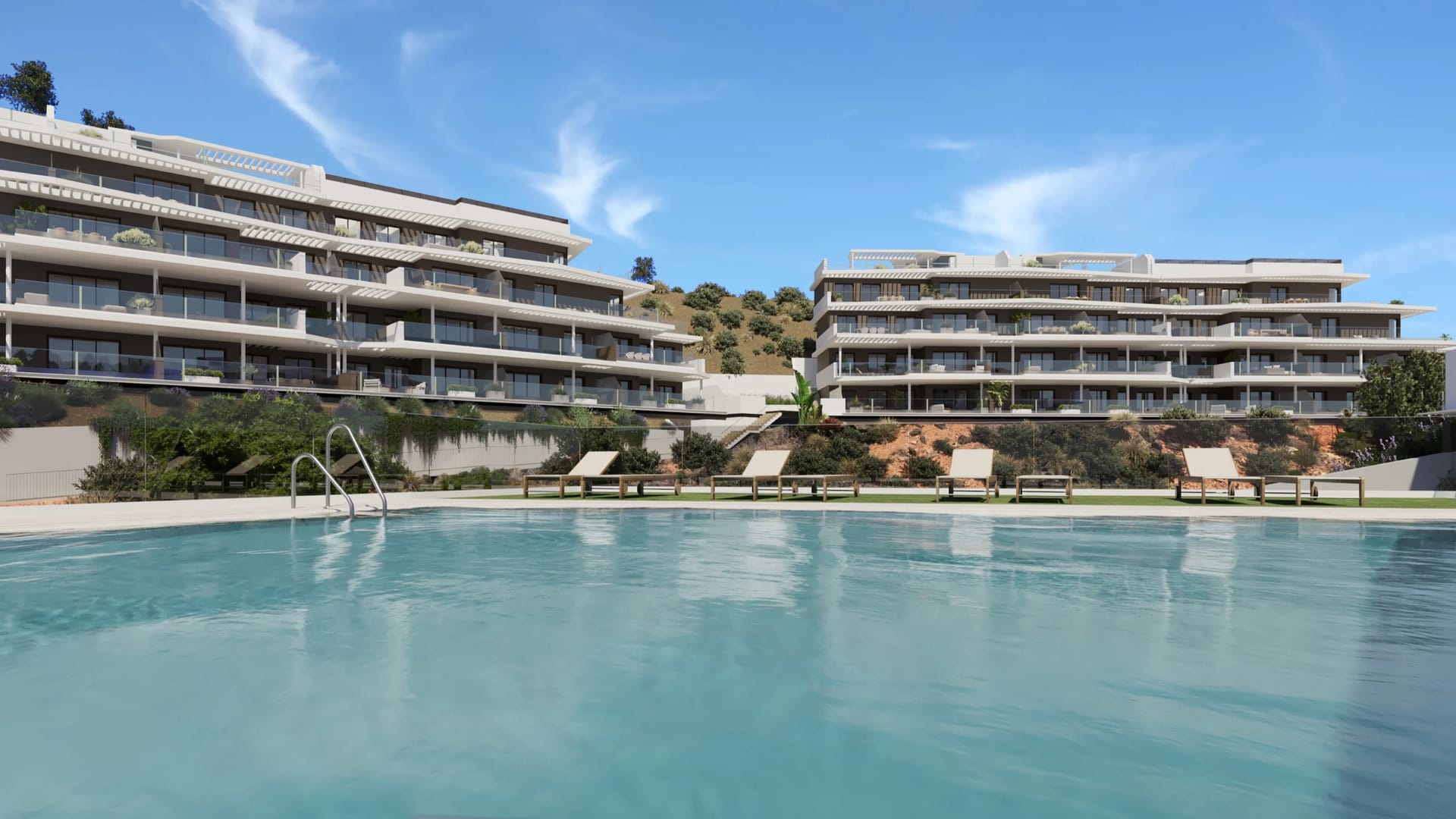 The adult pool, with the apartment buildings along the hillside behind it. Idilia Aire, Torre de Benagalbón, Rincón de la Victoria.