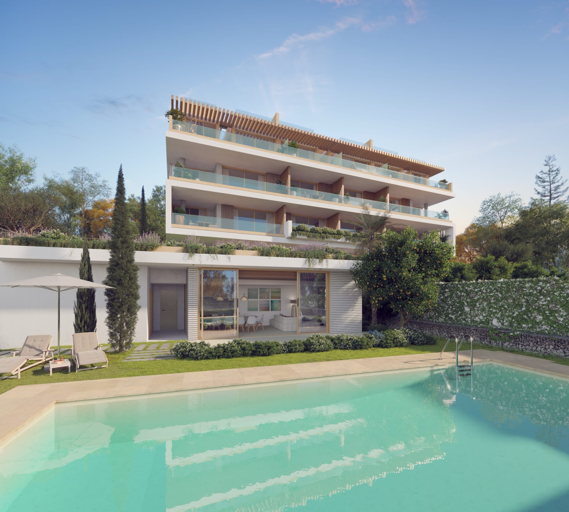 The pool and lawn in front of the building, with its terraces above. Kool, Calle Montemayor, Torremolinos.