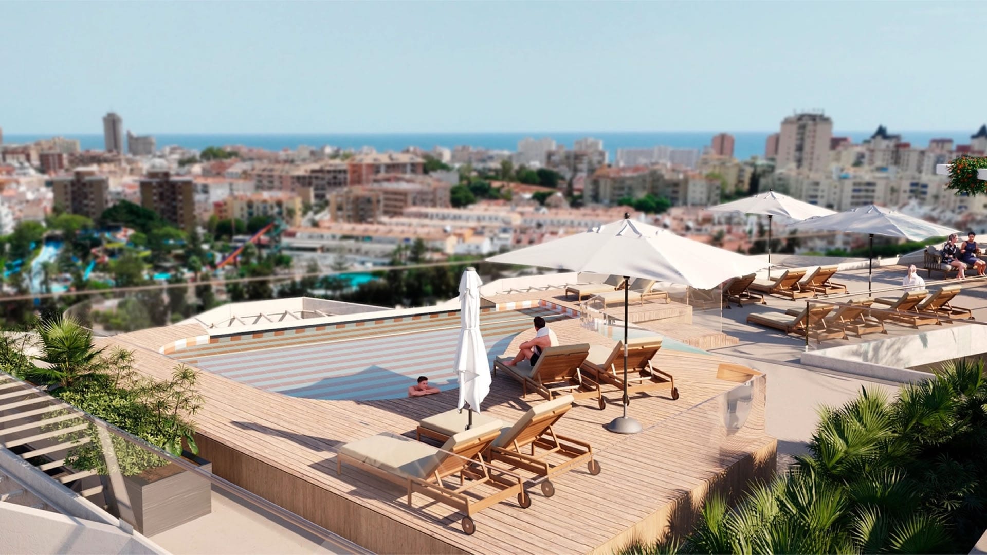 The roof deck by the infinity pool, with Fuengirola and the sea beyond. Lakün, Las Lagunas, Mijas.