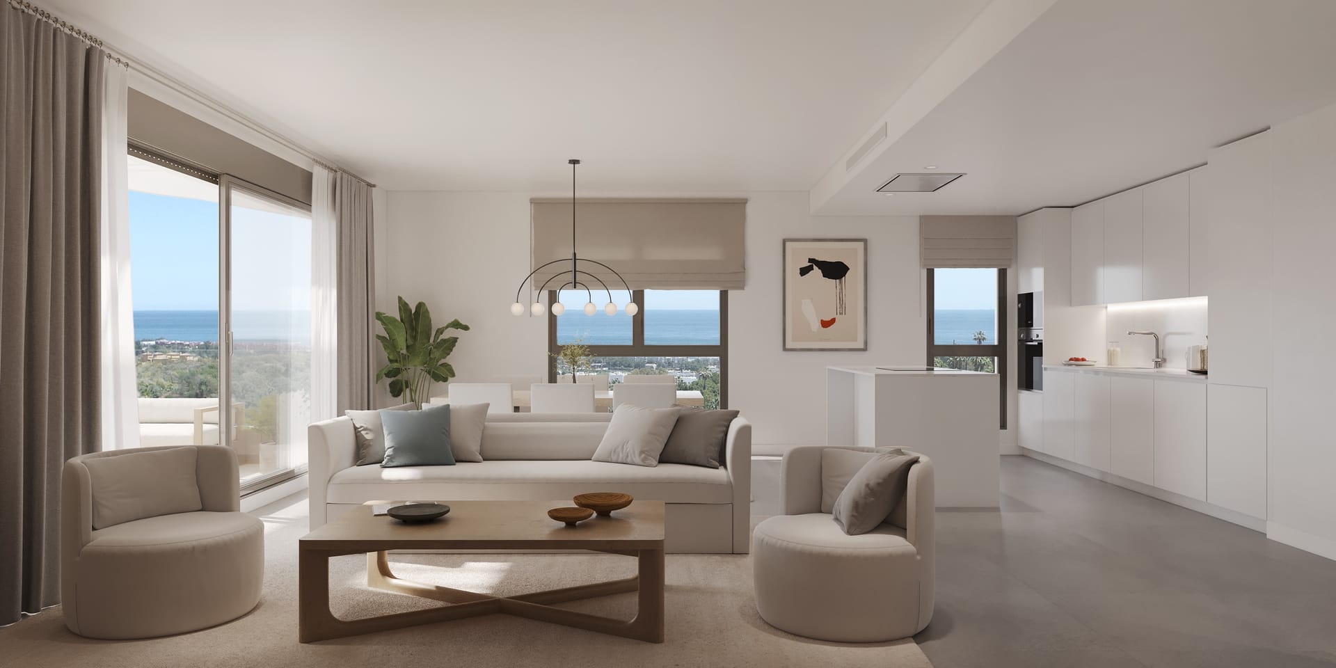 A living room open to a white kitchen, with windows looking out to the sea. Libella, La Resina, Estepona.