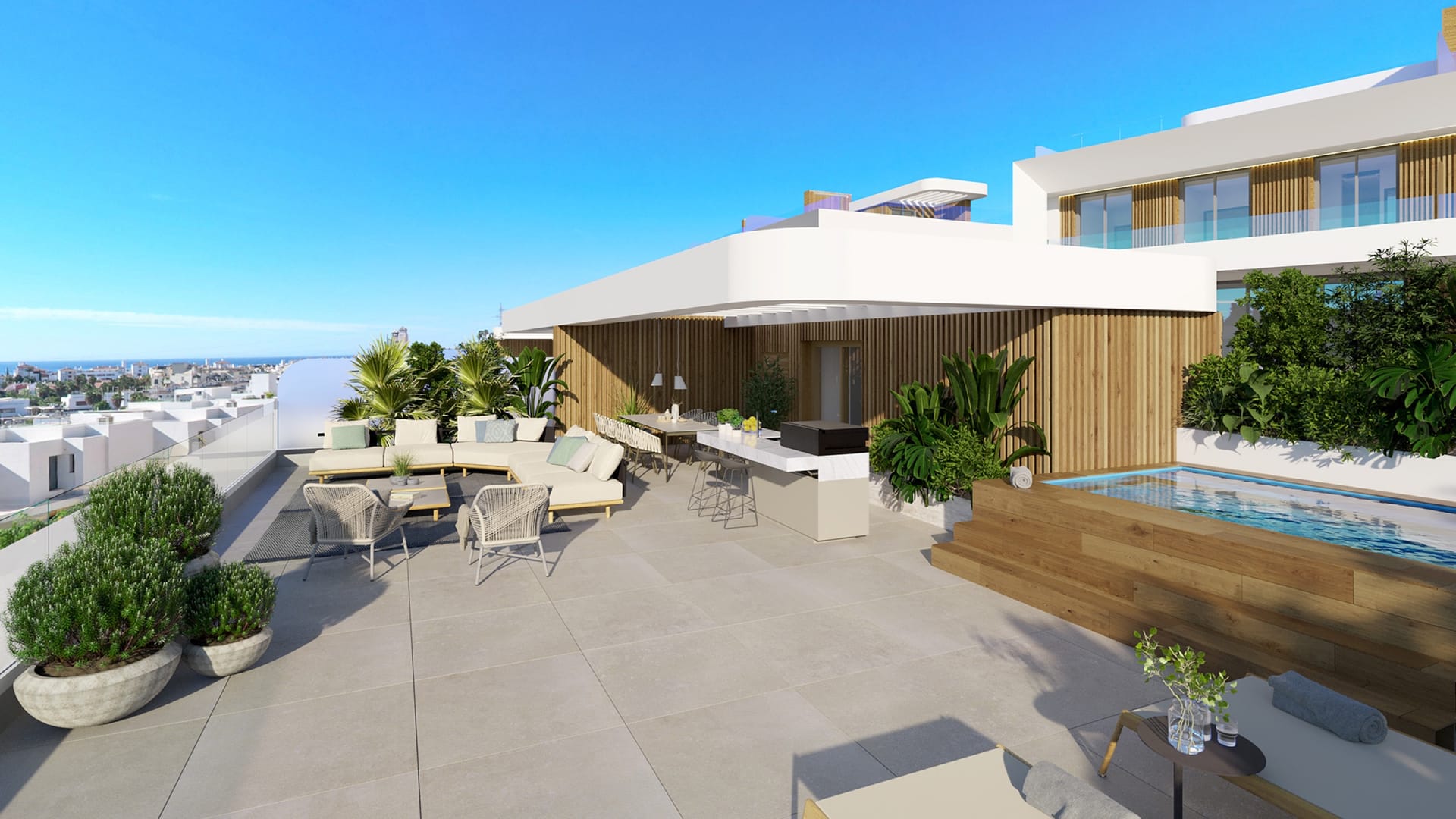 A roof solarium with a plunge pool, looking towards the coast. Lyra Residences, El Campanario, Estepona.