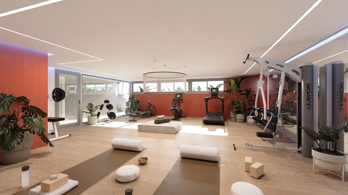 The gym, with a row of windows along the back wall. Macan Beach Residences, Torrequebrada, Benalmádena.