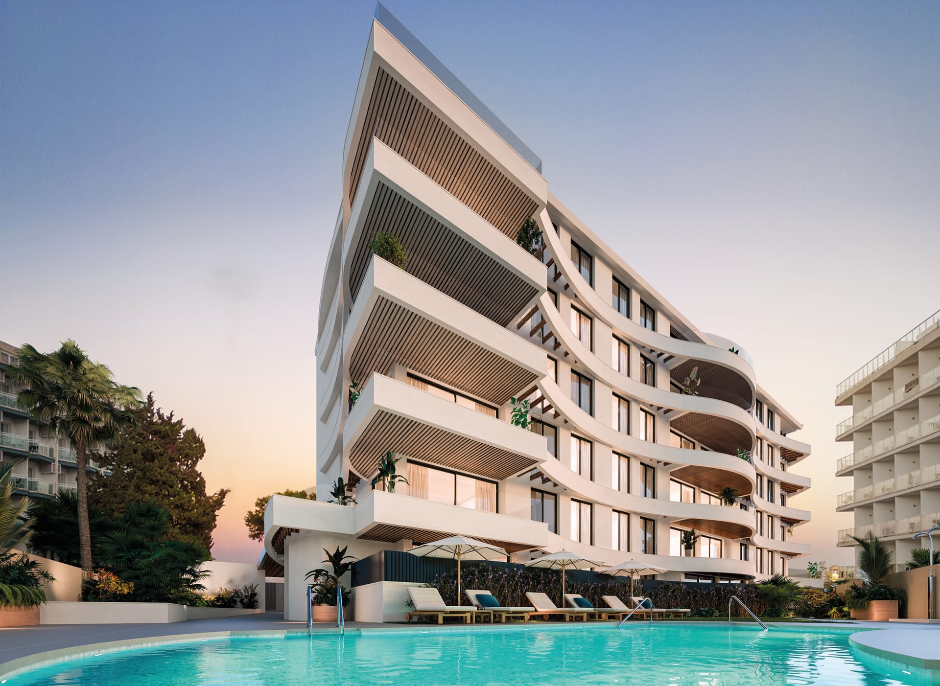 The building and its pool at dusk. Marina Golden Bay, Benalmádena Costa, Benalmádena.