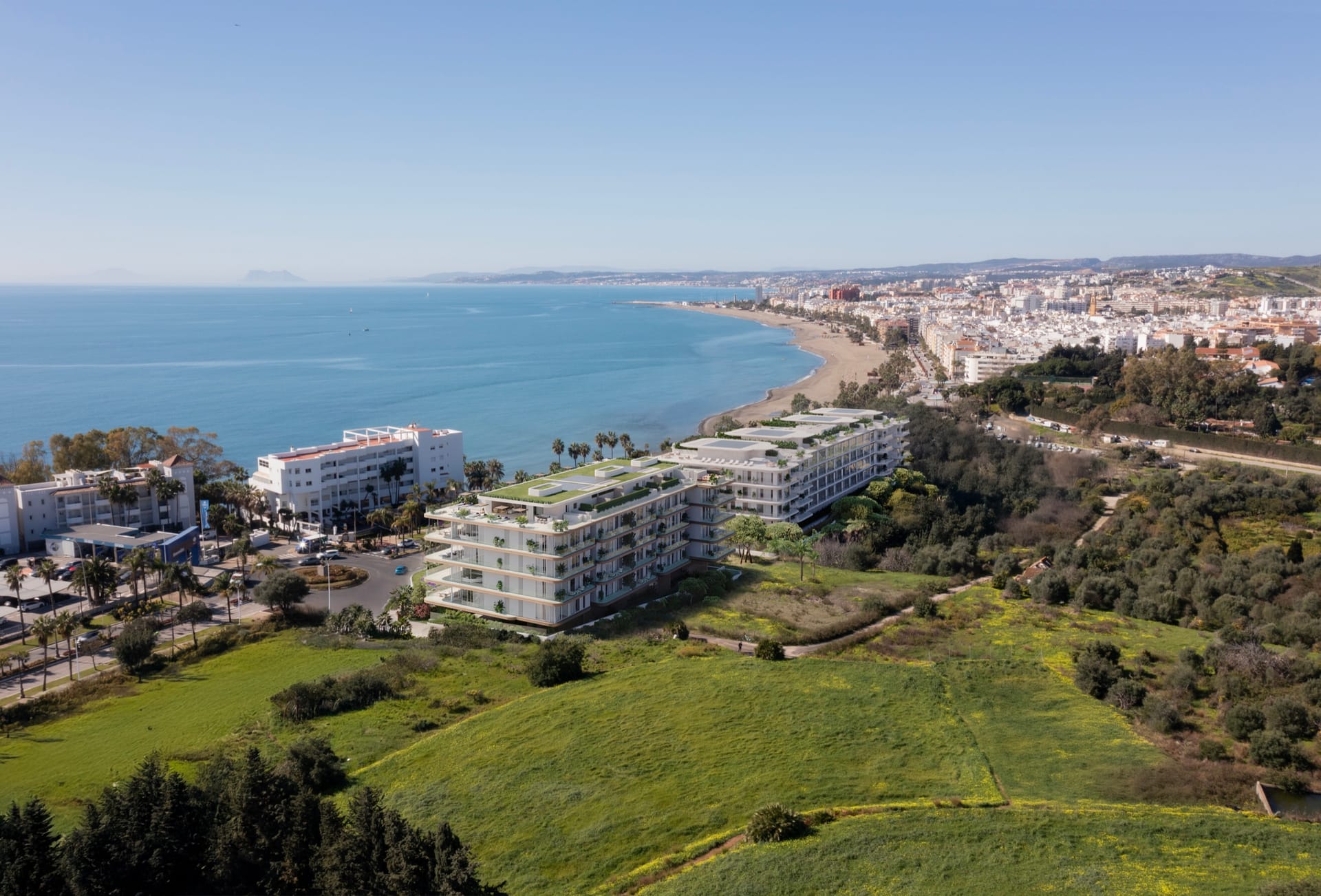 An aerial view of the coast at Estepona, with the town and the beach to the west. Nacaré, Avenida Litoral, Estepona.