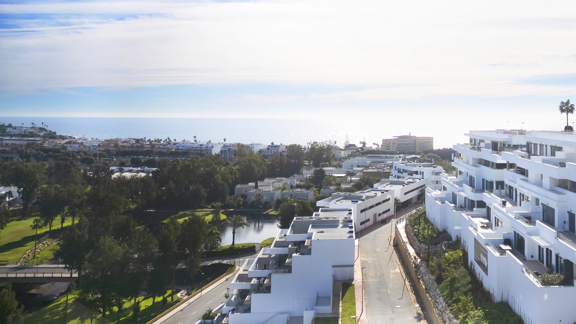 The view from a terrace over La Noria golf course to the sea. Navigolf Suites, La Cala de Mijas, Mijas.