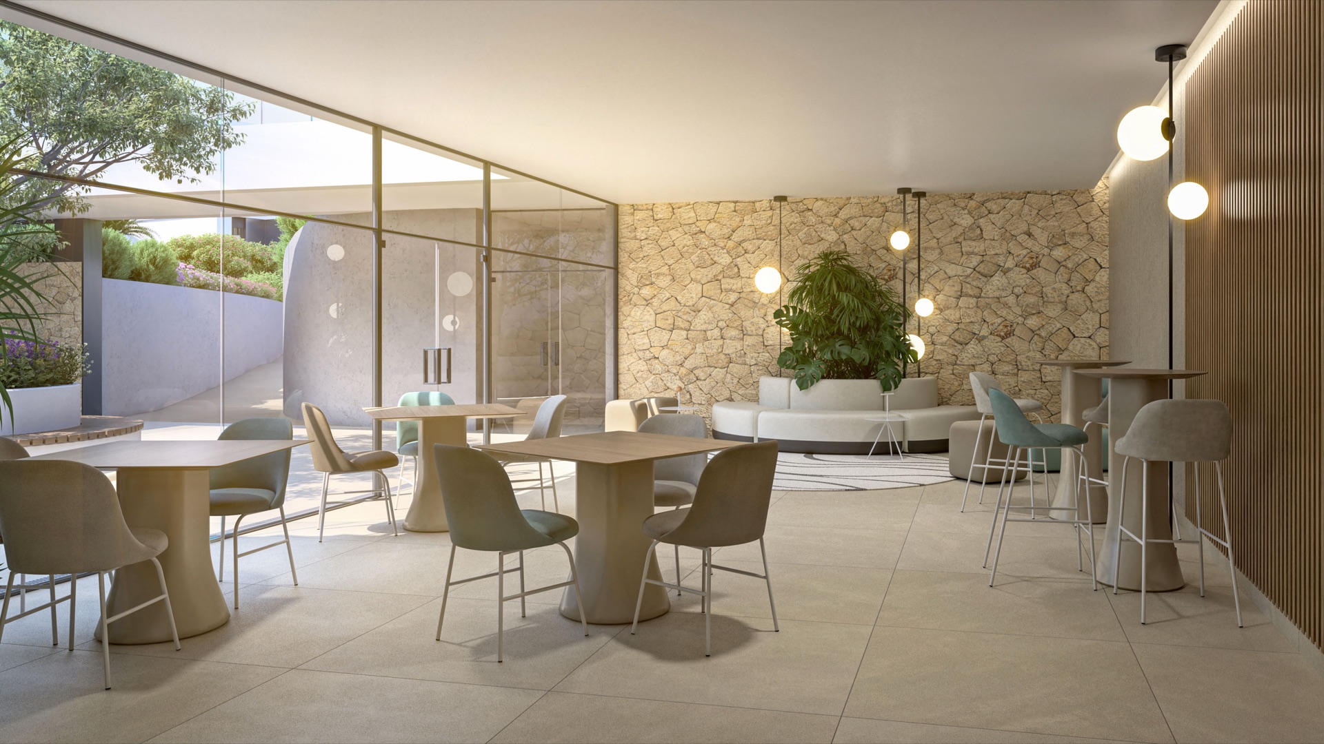 The social club room, with tables and chairs and a stone feature wall. Naya Residences, Atalaya, Estepona.