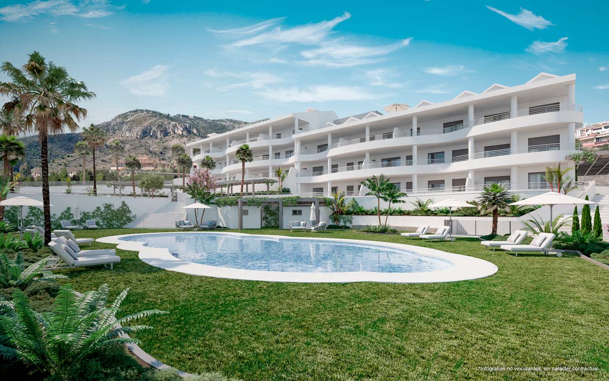 The shared pool and its lawn as pictured before building began, with apartments behind and the hillside above them. Nexus Residences, Arroyo de la Miel, Benalmádena.