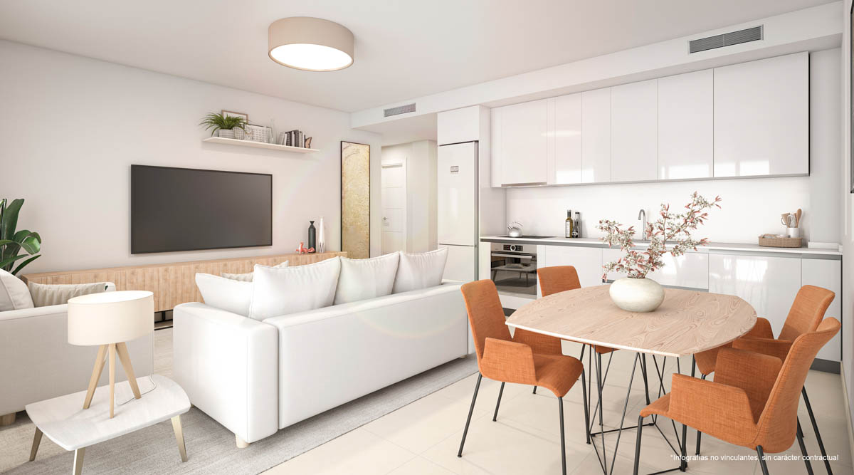 A living room and kitchen as pictured before building began, with white kitchen units, an oven set below the worktop and a round dining table. Nexus Residences, Arroyo de la Miel, Benalmádena.