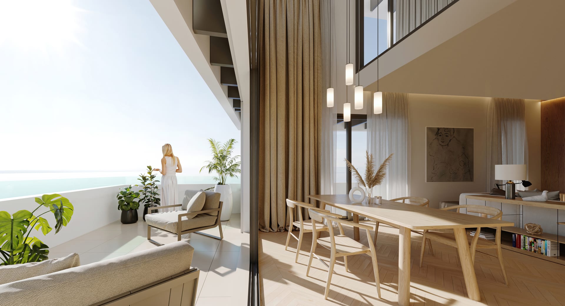 A duplex with a double-height dining room, a long timber table under white pendant lights, and a terrace looking over the sea. Octavia, Carretera de Cádiz, Málaga.