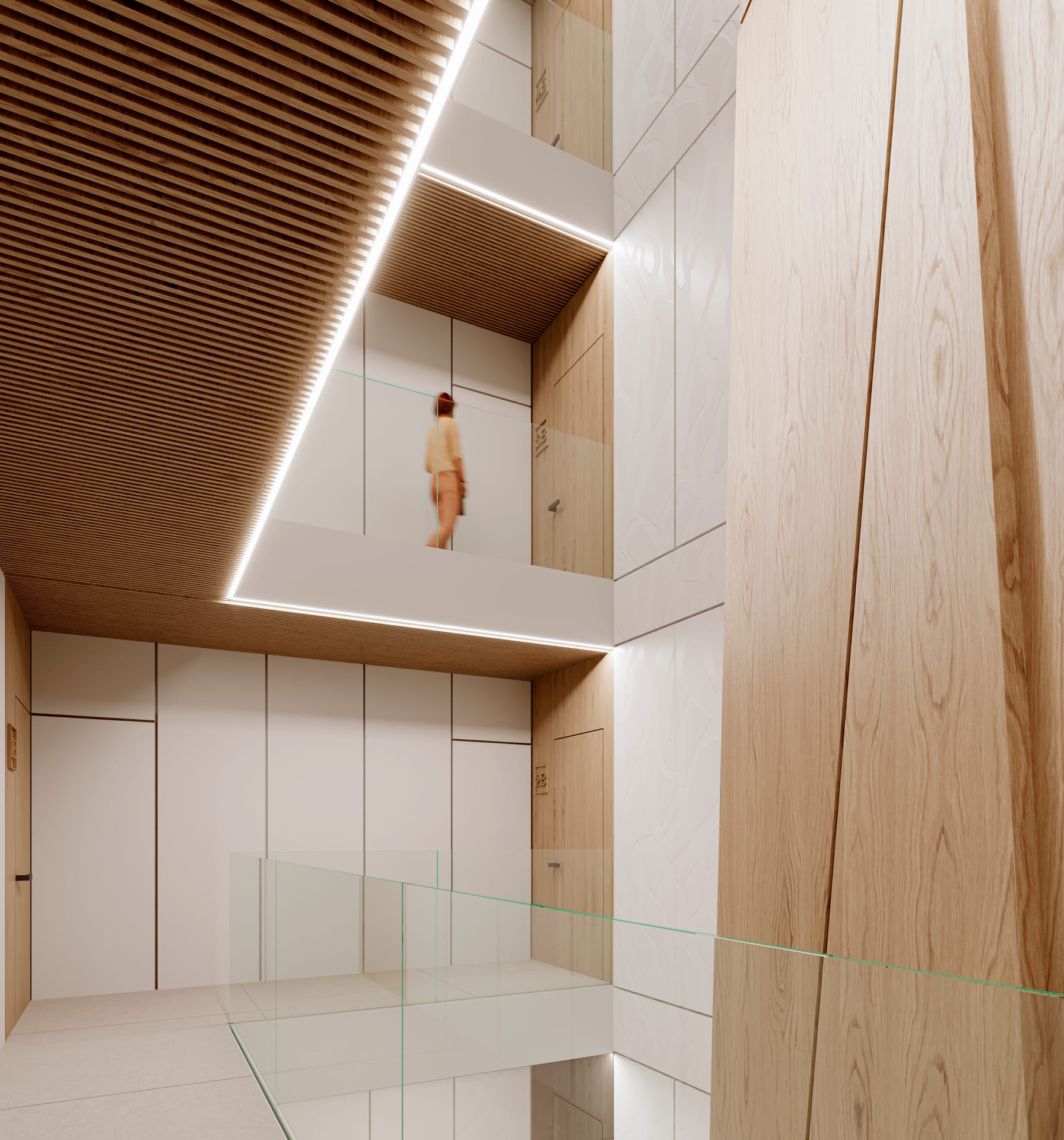 The atrium, two storeys high, with glass balustrades on the landings, white and pale timber panelling and a slatted timber ceiling lit along its edge. Octavia, Carretera de Cádiz, Málaga.