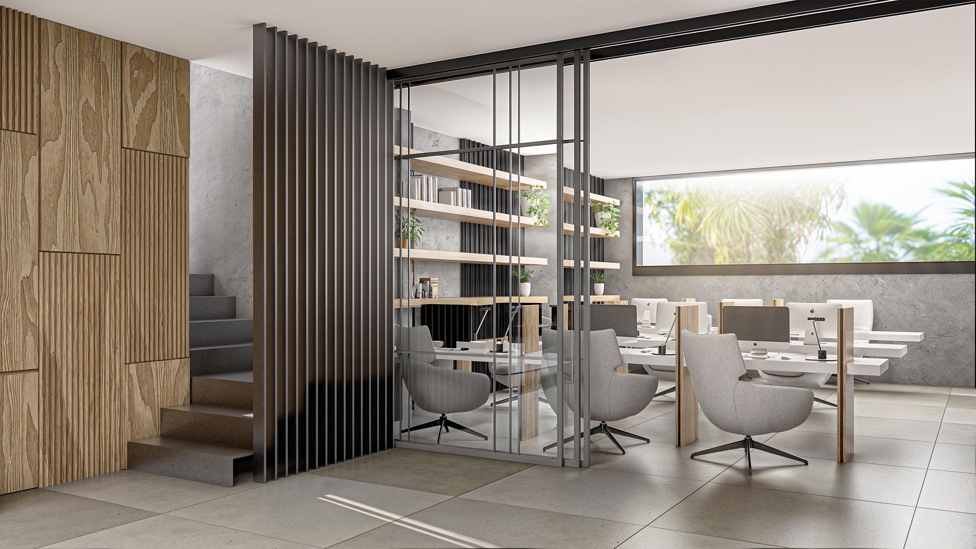The coworking room, with desks under a long window and timber shelving behind a glass screen. Palm Residences, La Resina, Estepona.