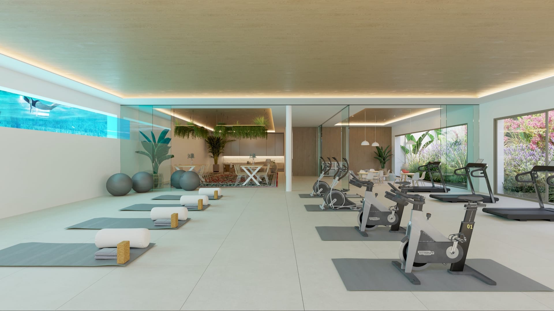 The shared gym, fitted with exercise machines. Privilege Suites, Casares Costa, Casares.