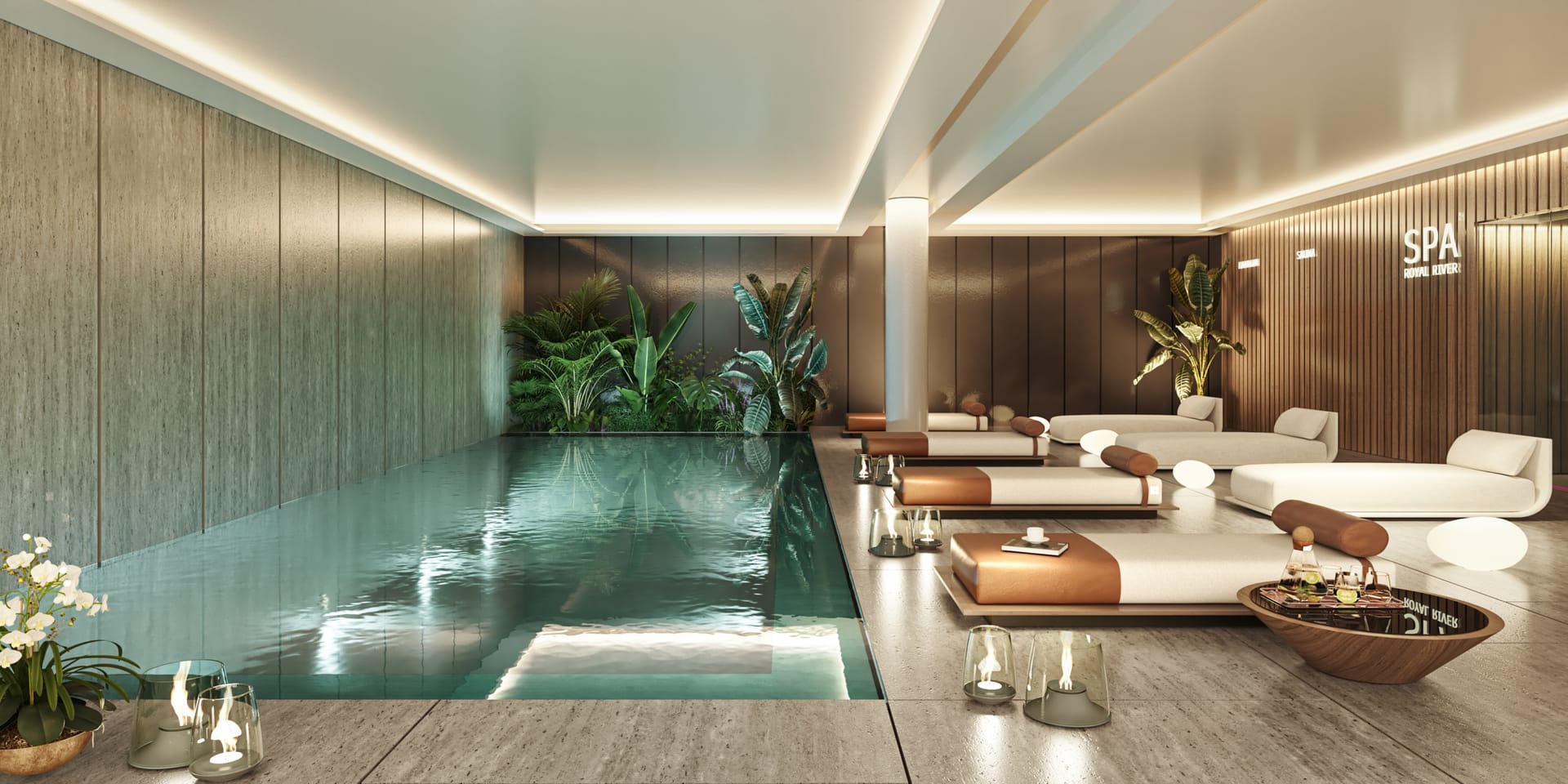 The spa, with an indoor pool, loungers and planting along the far wall. Royal River, Río Real, Marbella.
