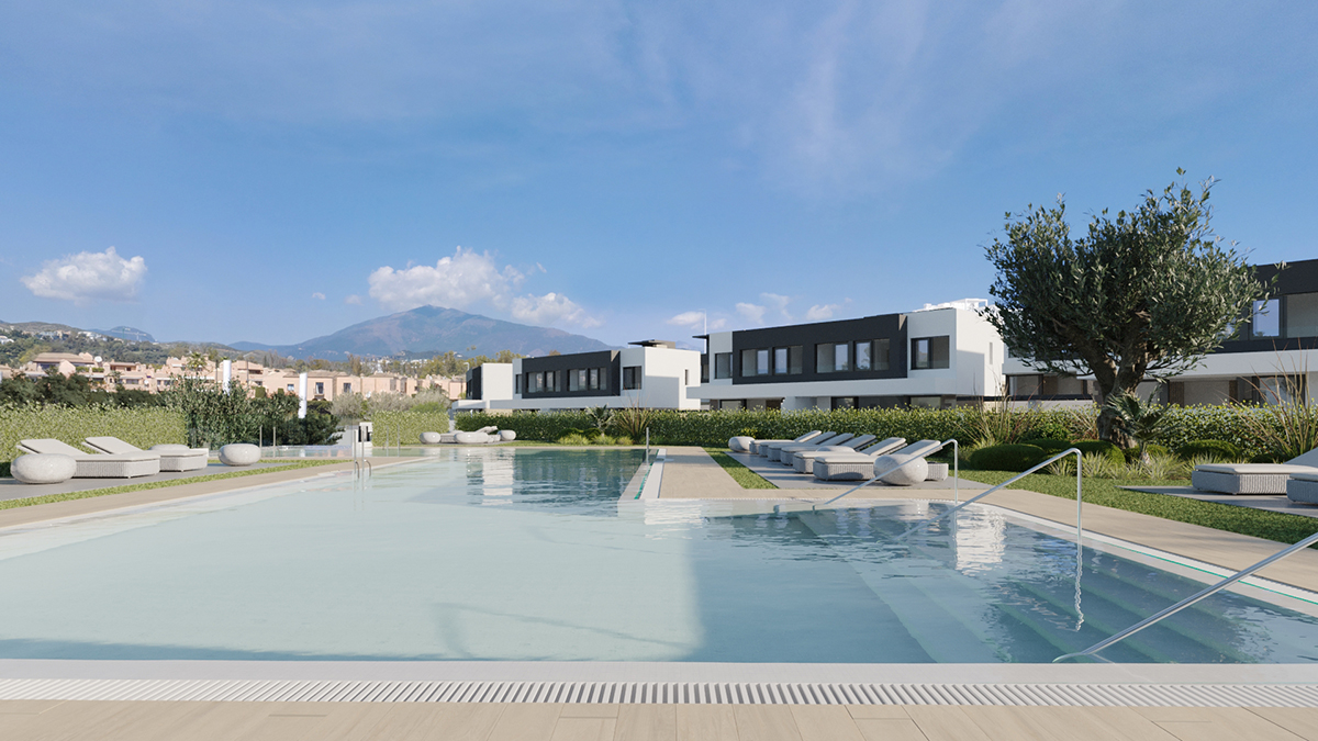 The pool seen from its far end, with the villas behind it. Serene Atalaya, Atalaya Golf, Estepona.