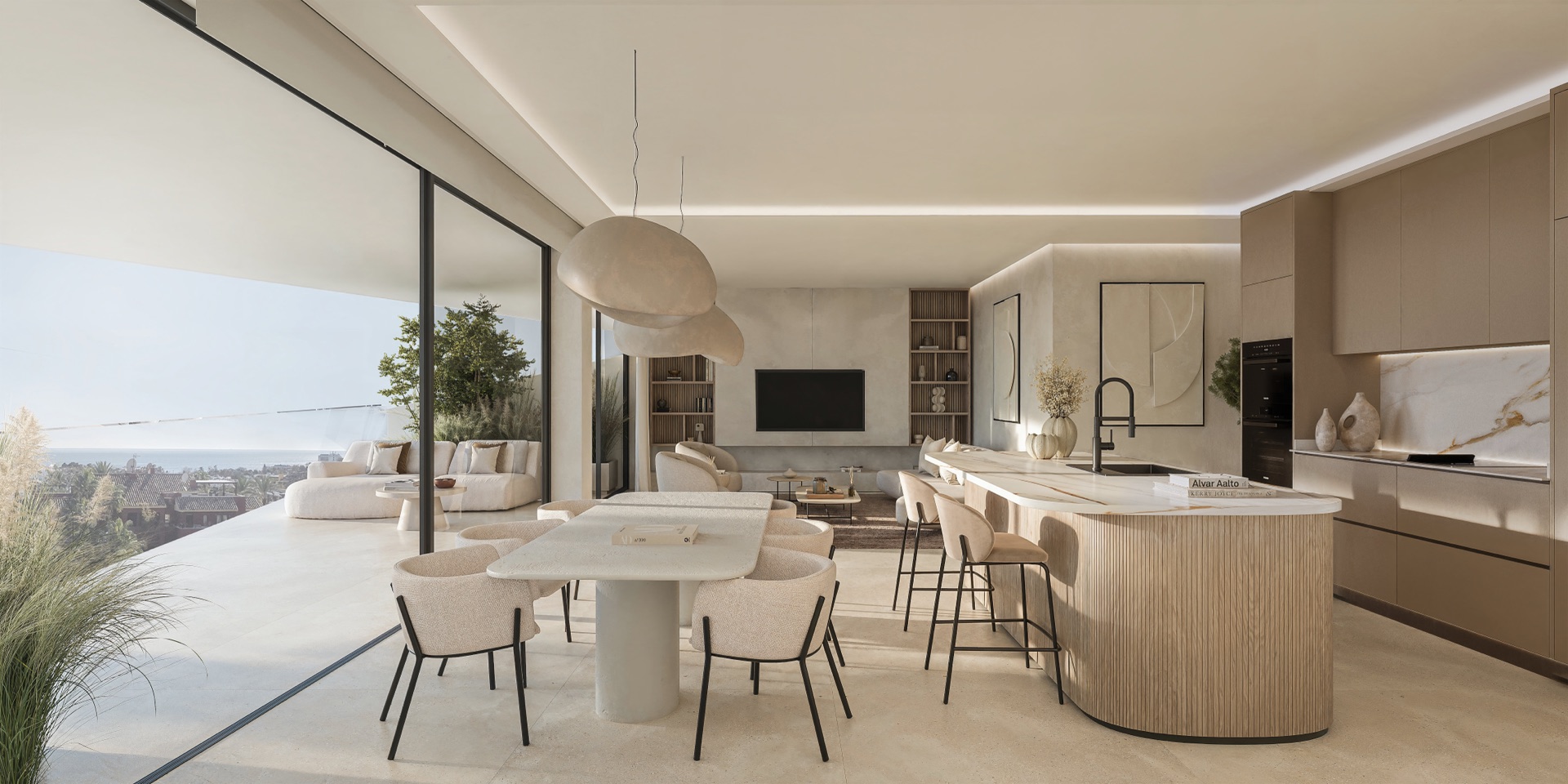 An open kitchen and dining room, with a curved island faced in ribbed wood, a marble-patterned splashback and a glass wall onto the terrace. Solaia Residence, Cancelada, Estepona.