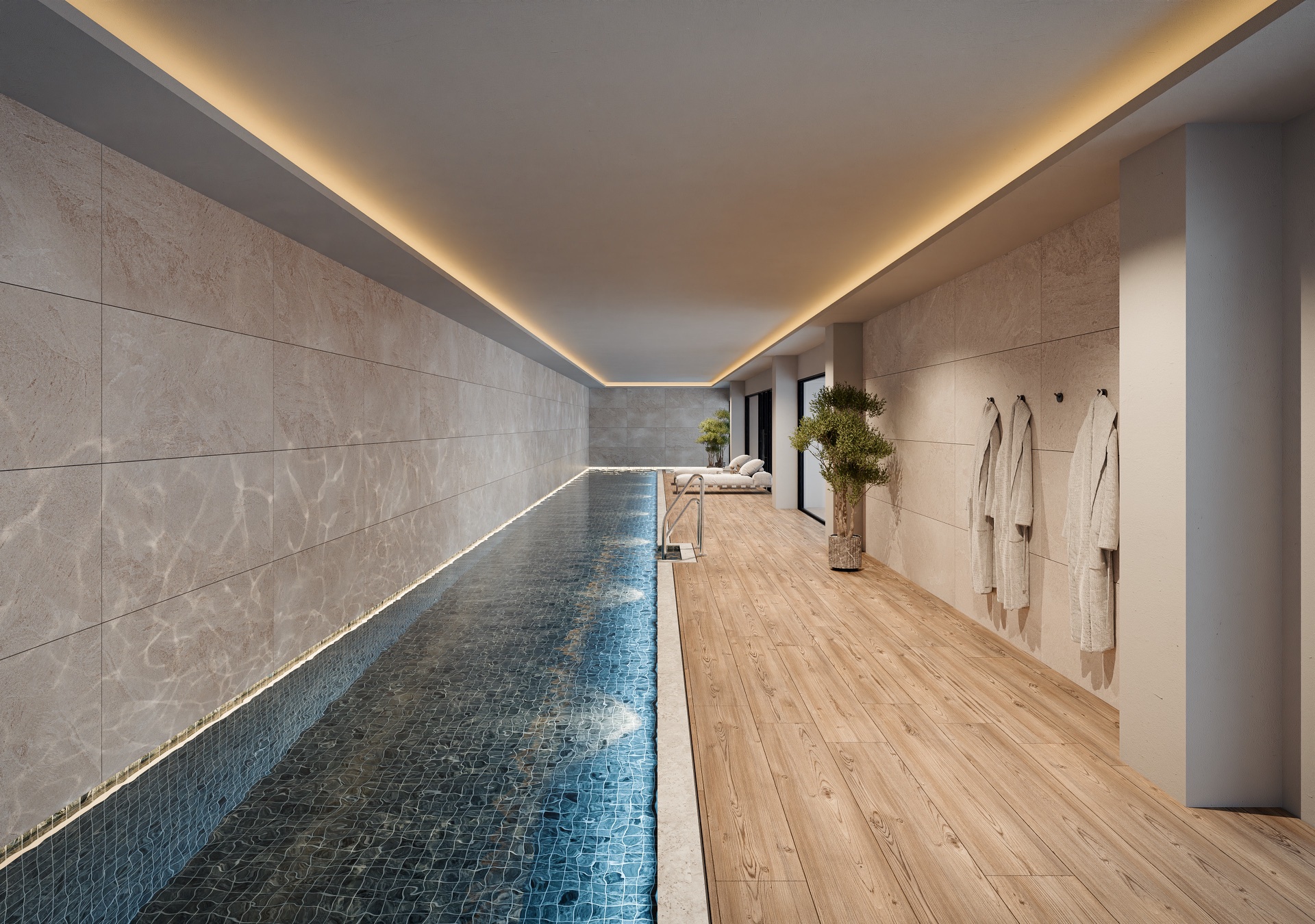 The indoor lap pool, heated for year-round use, with robes set out at the poolside. Soleil, Altos de los Monteros, Marbella.