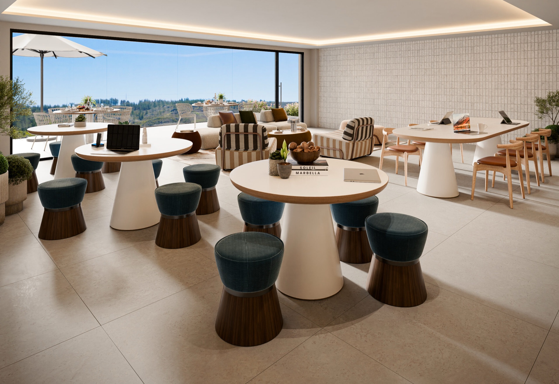 The residents’ social lounge, doubling as a coworking space. Soleil, Altos de los Monteros, Marbella.