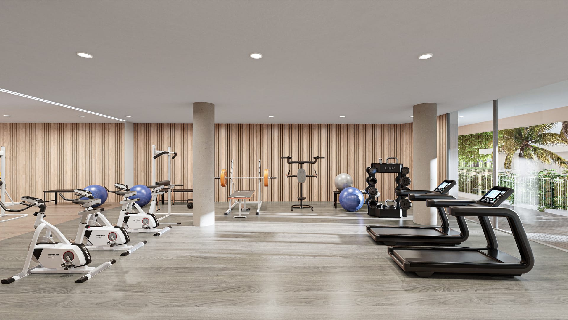 The gym, with exercise bikes, running machines and weights. South Sand, Las Mesas, Estepona.