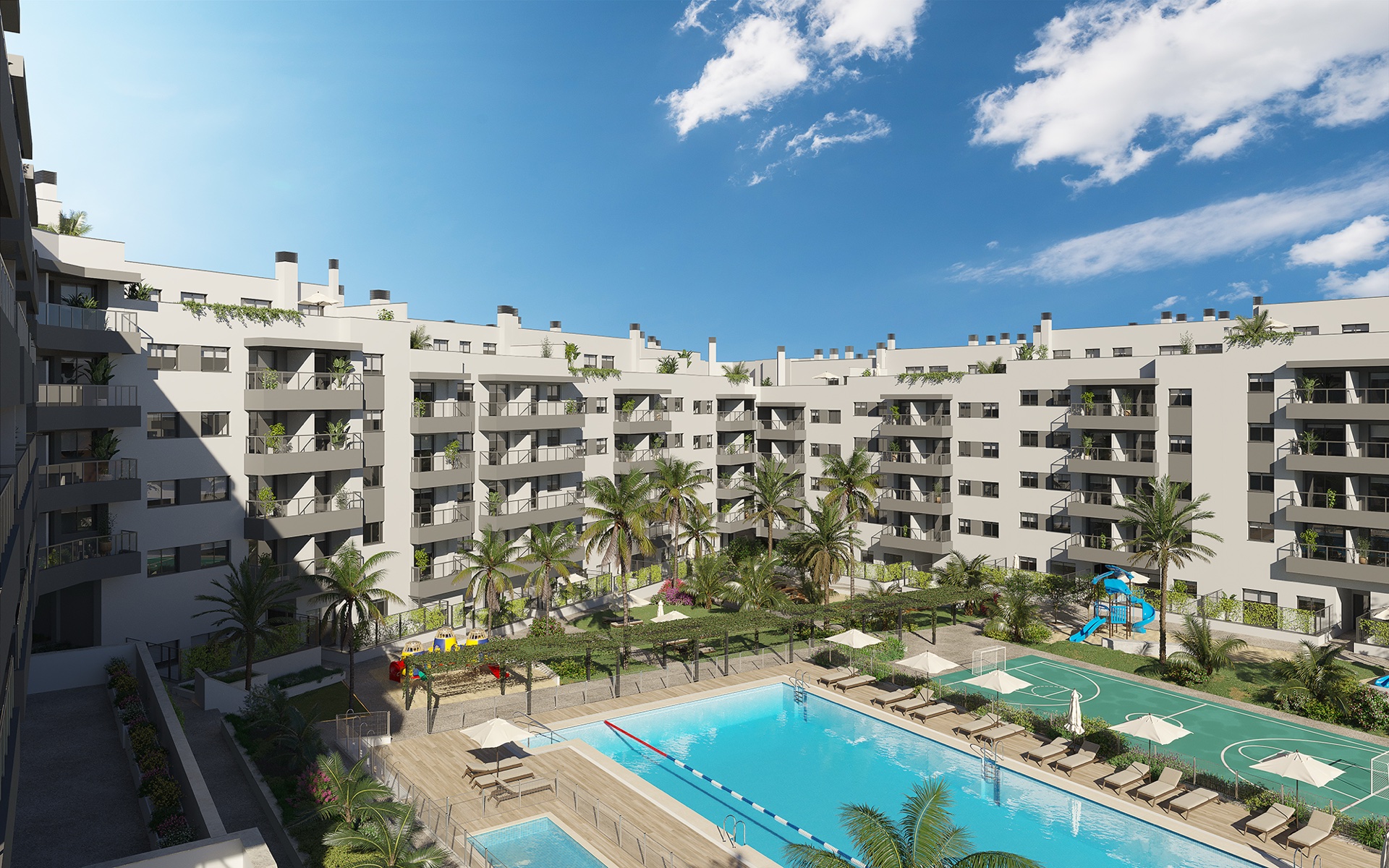 The gardens between the buildings, with lawns, planting and paths running through them. Suite Mijas Phase Three, Las Lagunas de Mijas, Mijas.