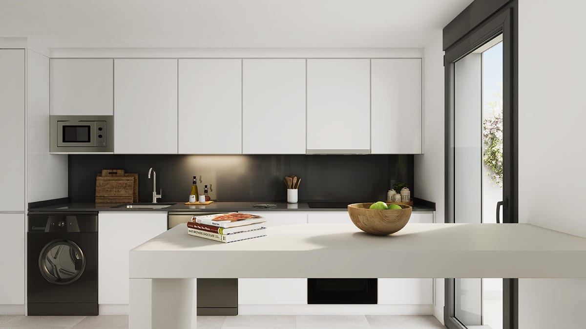 The kitchen, finished in white with a dark quartz worktop. Sunset Bay Estepona, La Gaspara, Estepona.