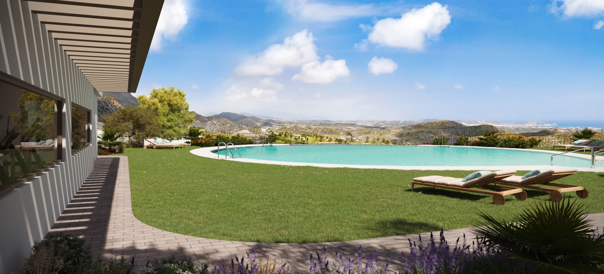 The pool and lawn, looking out over the hills toward the coast in the distance. Swing Golf, Pilar de Jaravía, Pulpí.