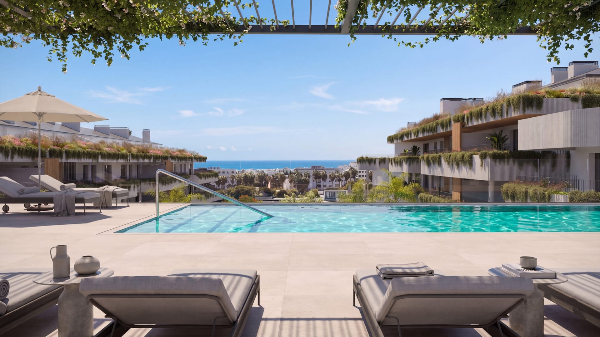 The pool on the roof, with the sea beyond. The Grove, San Pedro Alcántara, Marbella.