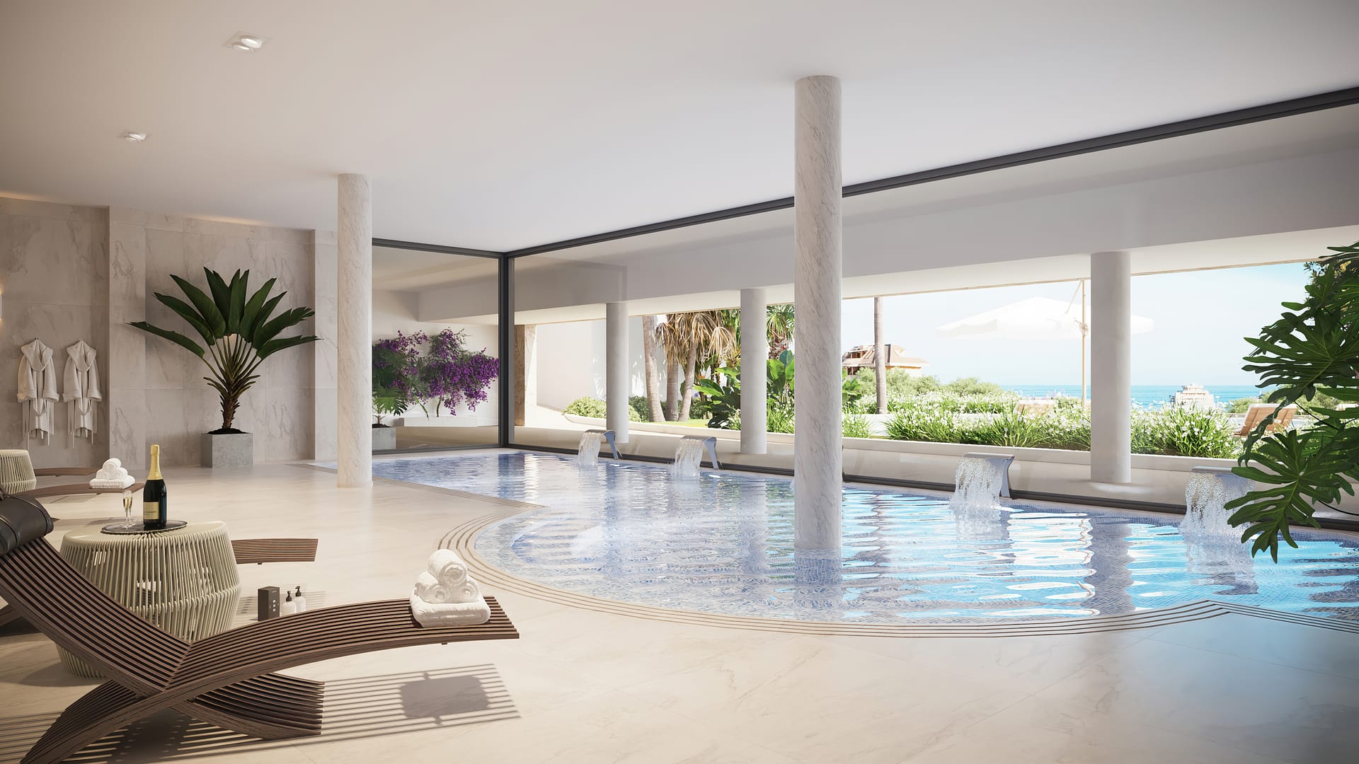 The spa, with its heated indoor pool and loungers along the glass wall. The Kos, El Higuerón, Fuengirola.