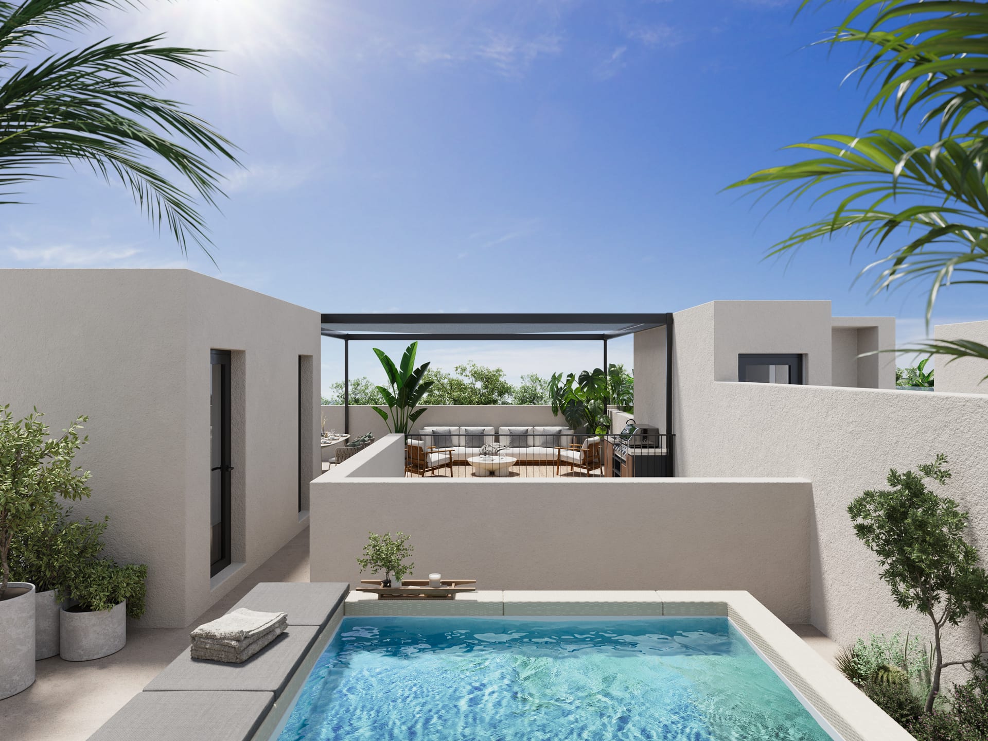 A roof terrace, with a small pool in the foreground and a seating area under a pergola on the level above it. Unique Pedregalejo, Pedregalejo, Málaga.